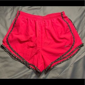 Bright pink Nike dri-fit shorts